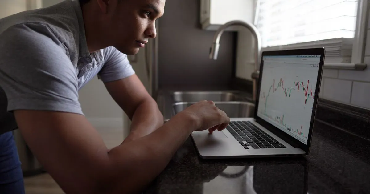 Payday loans in Canada guide - borrower reviewing loan costs on a laptop at home