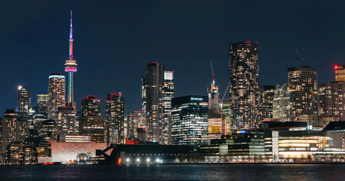 Toronto skyline at night - 24/7 payday loans Ontario applications never close