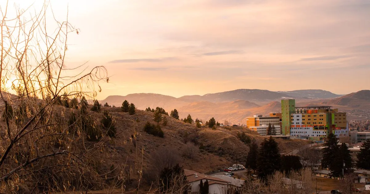 Sunset over the hills and city of Kamloops BC, home to payday loans Kamloops borrowers