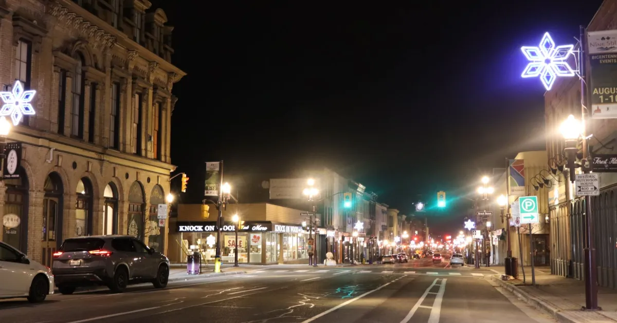George Street lit up at night in downtown Peterborough Ontario, home of payday loans Peterborough borrowers