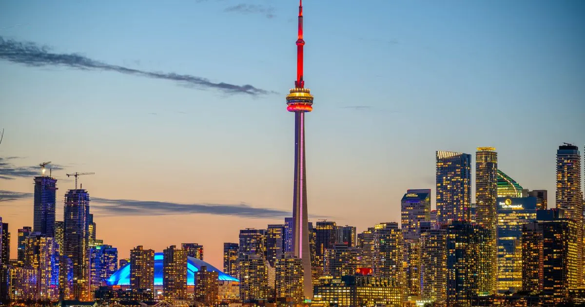 Toronto skyline at night - payday loan applications are open 24/7 across Canada