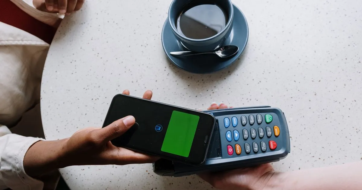 Making a contactless payment after a $400 payday loan in Canada landed by e-Transfer