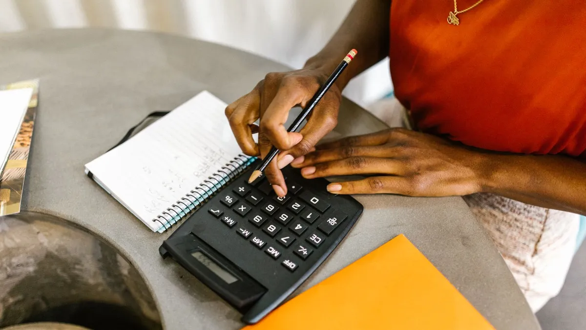 Working out the real cost of a payday loan with a calculator before applying